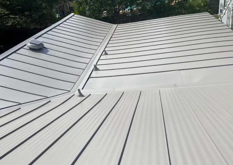 Solar attic fan installed on a metal roof for Roof Ventilation in Fair Oaks